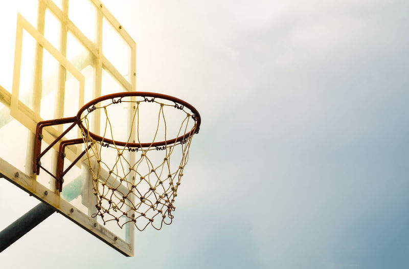 Low angle view of basketball hoop against sky