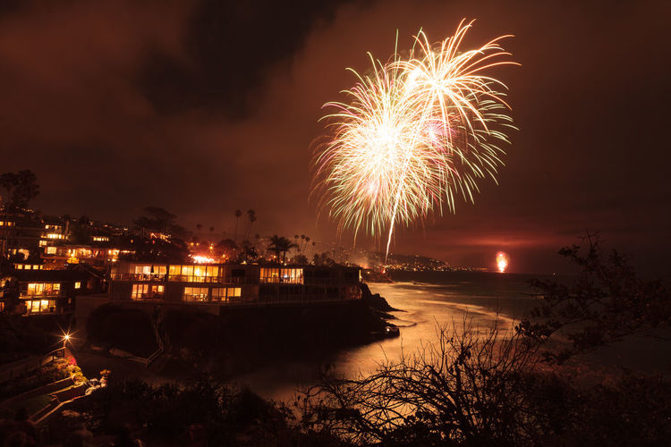Firework display at night in laguna beach, california