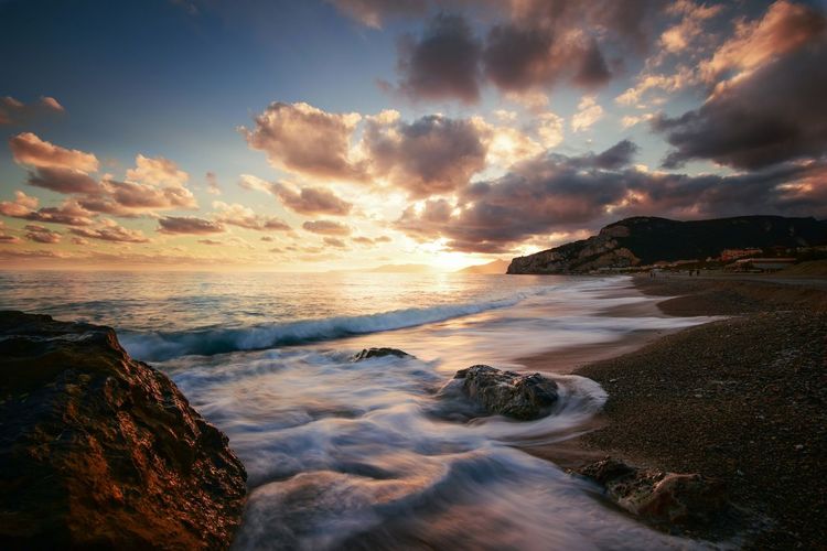 Scenic view of sea against sky during sunset