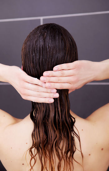 Rear view of young woman with wet hair