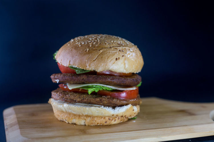 Close-up of burger on cutting board