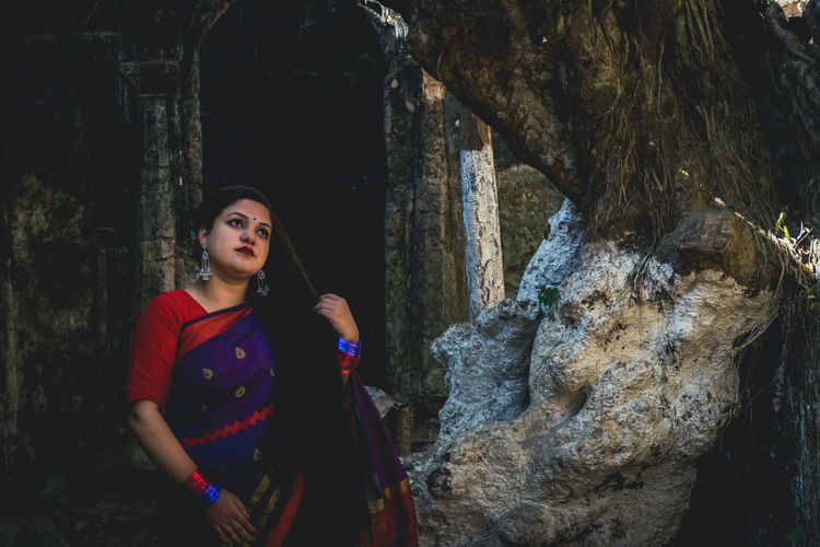 Beautiful woman in sari looking away