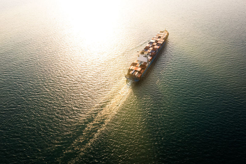 Aerial view container cargo ship carrying commercial container import export business 