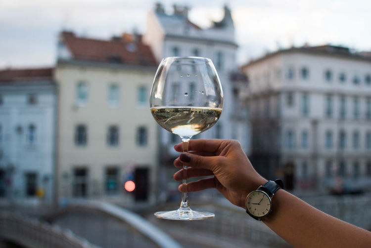 Close-up of hand holding a wineglass 
