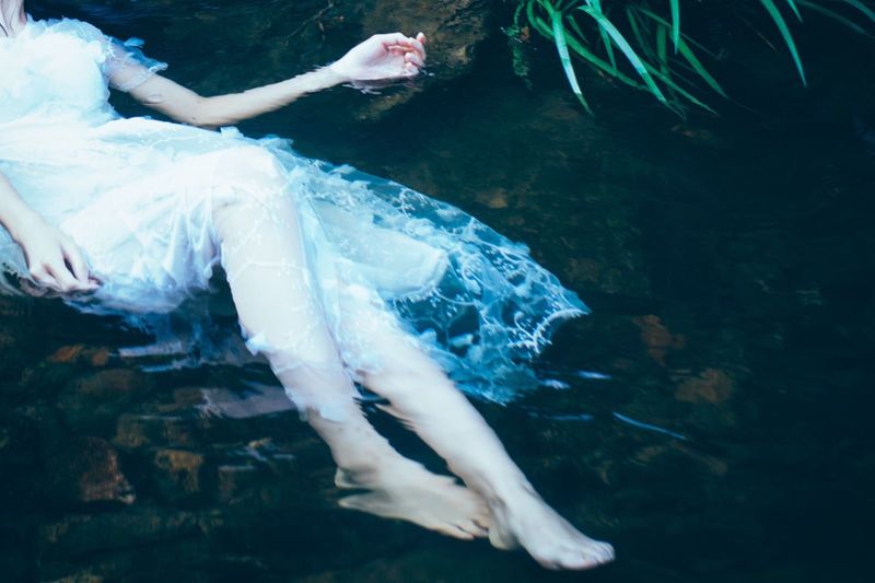 Woman swimming underwater