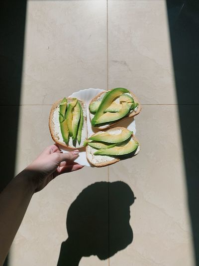 Avocado toast. sunlight. conceptual photo
