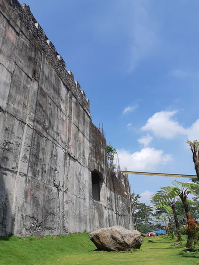 Low angle view of old building against sky