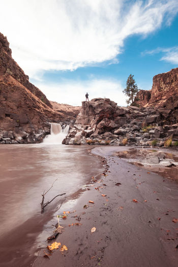 Scenic view of river and rock formations