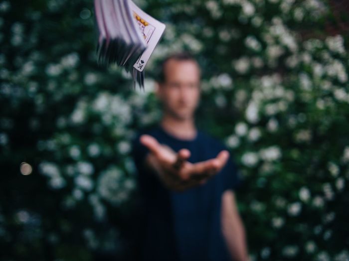 Playing cards in mid-air