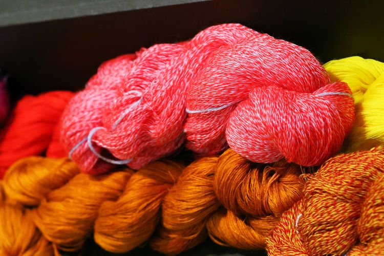 Close-up of multi silk thread colored cliseup macro background 