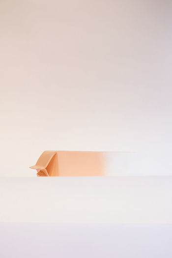 Digital composite image of paper against white background
