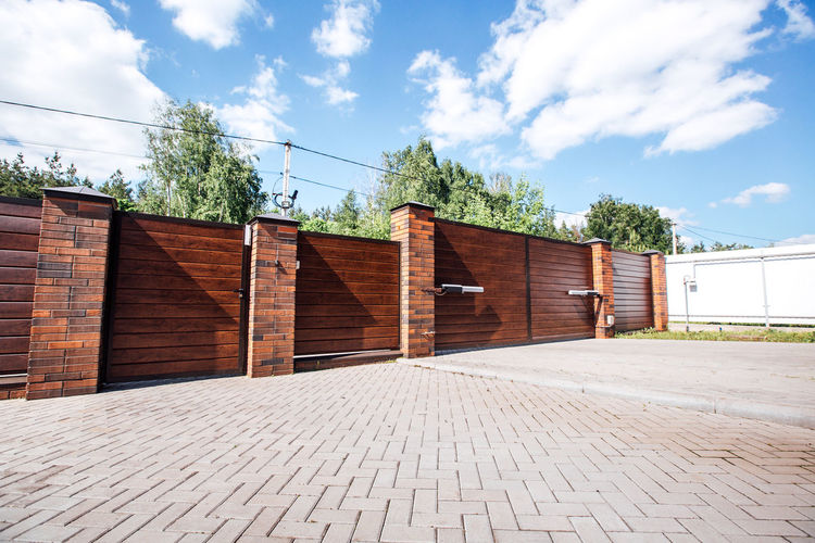 Modern fence with automatic gate