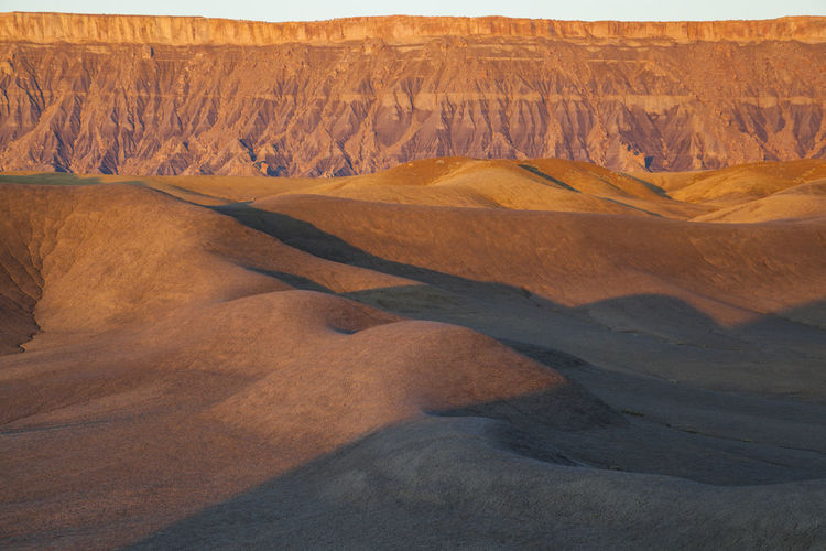 North caineville mesa and badlands at sunrise, upper blue hills, utah