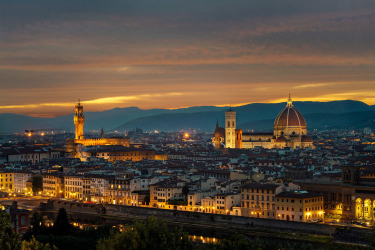 Cityscape against sky during sunset