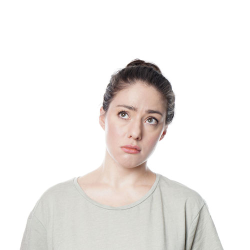 Portrait of a beautiful young woman over white background