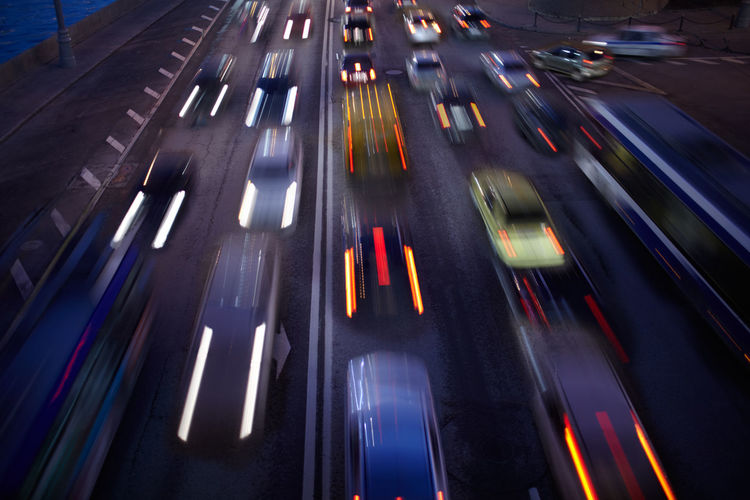 Blurred motion of cars on street at night