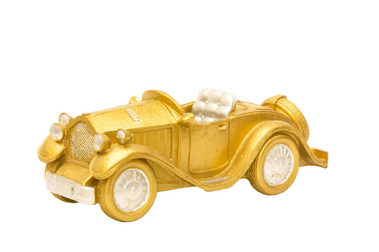 Close-up of toy car against white background