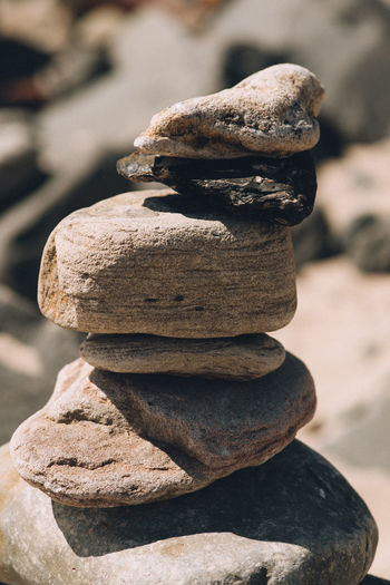 Close-up of stone stack on rock