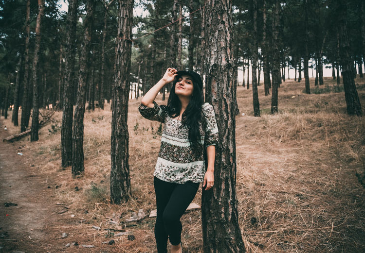 Person standing in forest