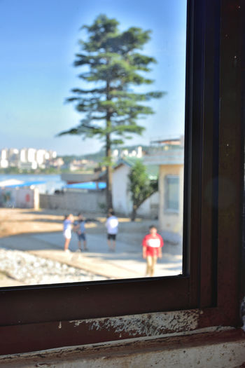 City street seen through glass window