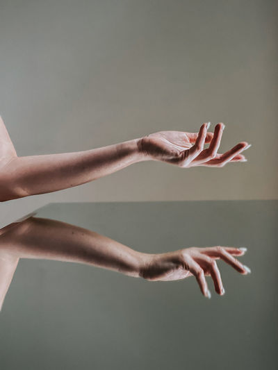 Gesture reflection hands in a mirror 