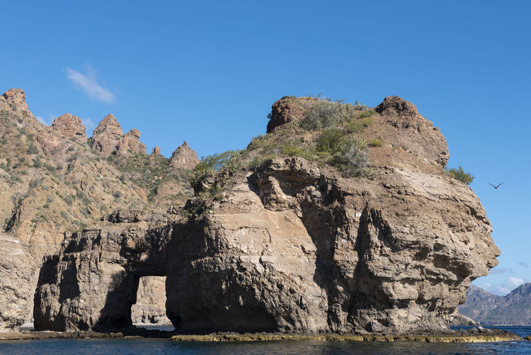 Natural arch in a rock at del carmen island in loreto bay, baja