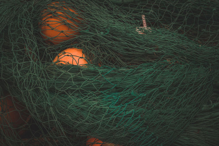 Close-up high angle view of fishing net