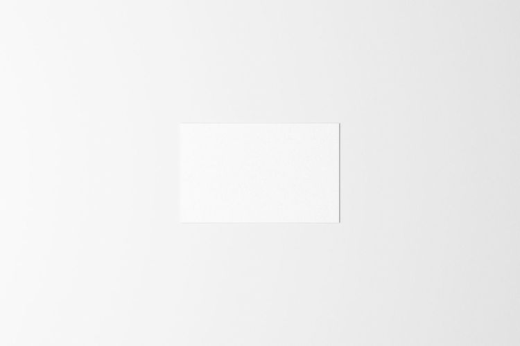 High angle view of blank paper against white background