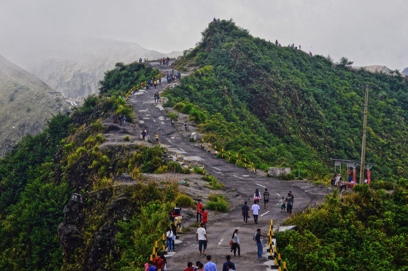 High angle view of people walking on mountain