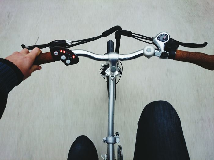 Blurred motion of person riding bicycle
