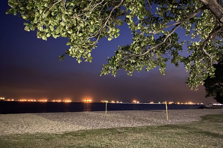 Scenic view of sea against sky at night