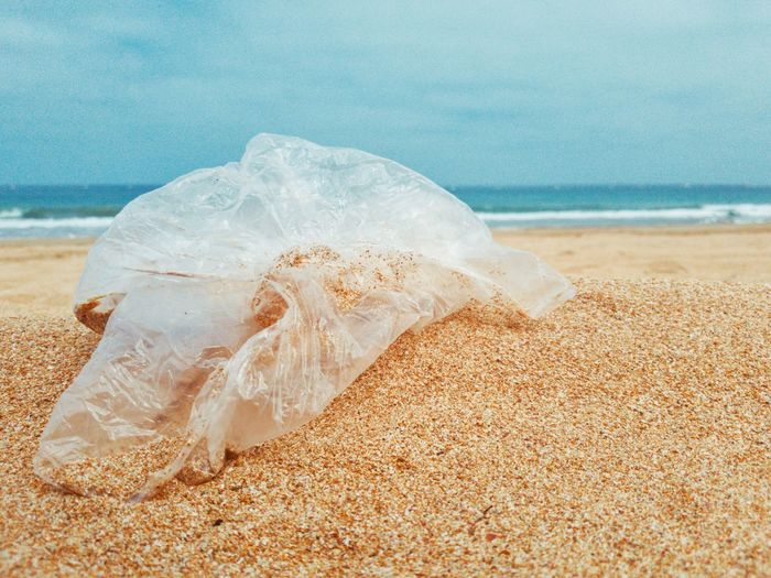 Close-up of a plastic bag on beach
