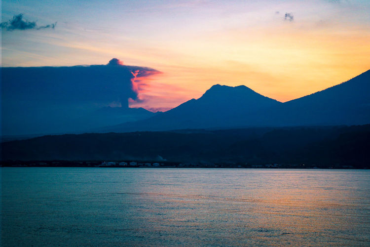 Scenic view of sea against sky during sunset view via ketapang - selat bali, indonesia