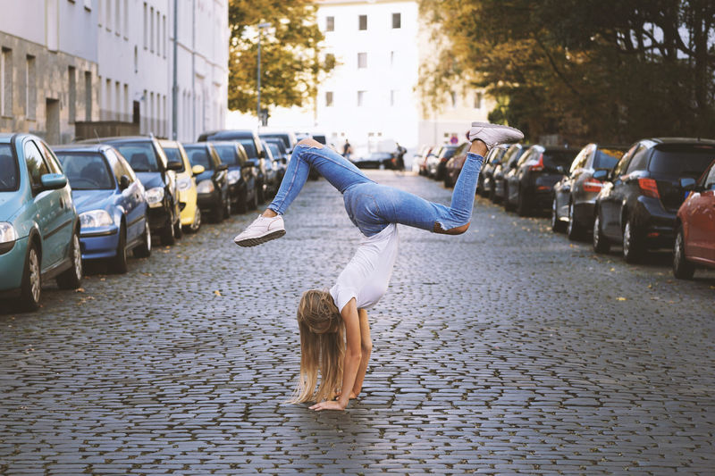 Rear view of woman on street in city