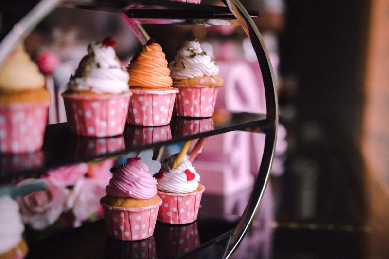 Creamy cupcakes in bakery