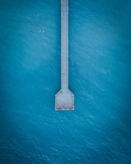 High angle view of information sign on sea