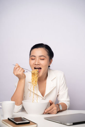 Young woman eating food