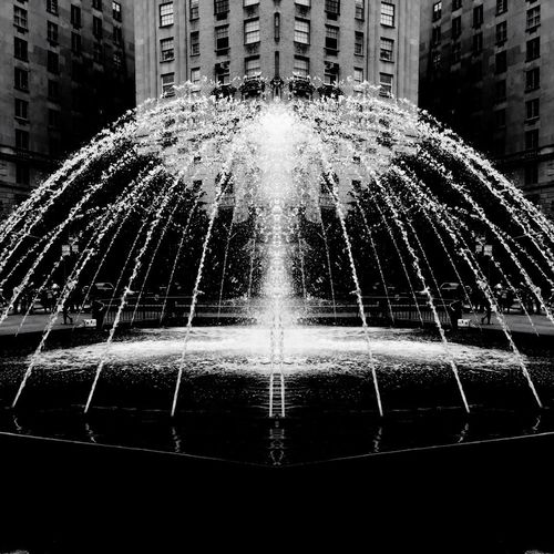 Fountain in front of building
