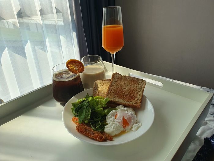 High angle view of breakfast served on bed