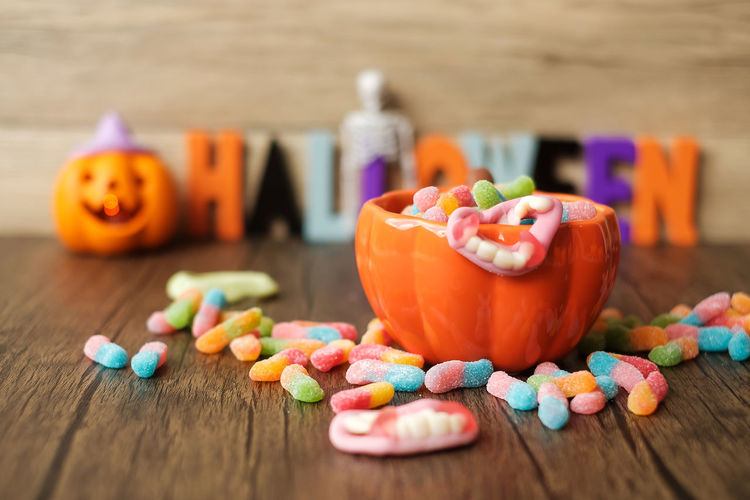 Close-up of multi colored candies on table