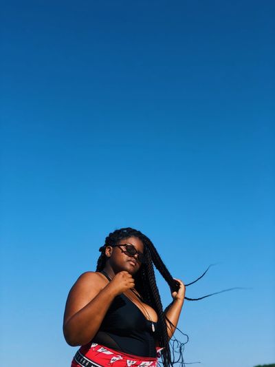 A peng black girl basking in the african sun 