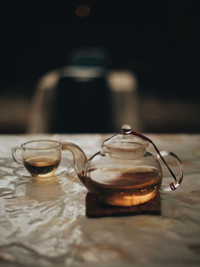 Close-up of tea in glass on table