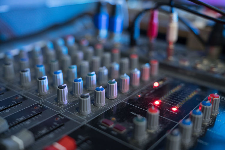 Close-up of illuminated sound mixer