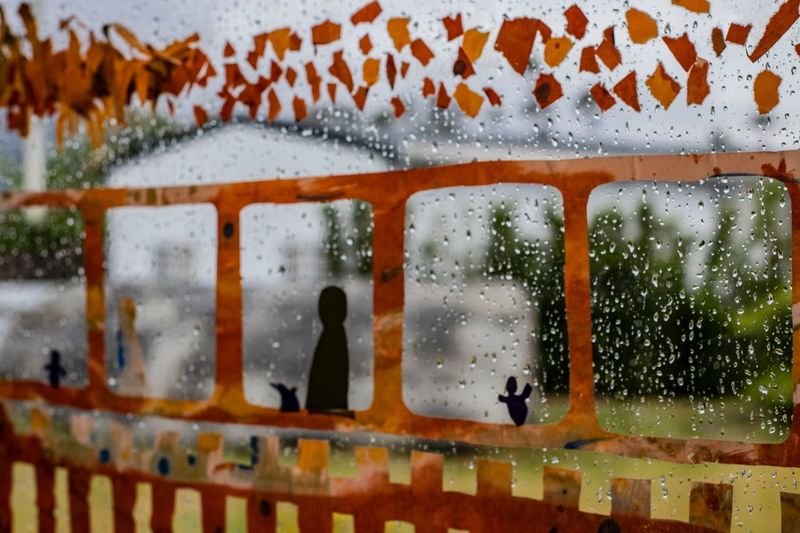 Water drops on glass window of rainy season