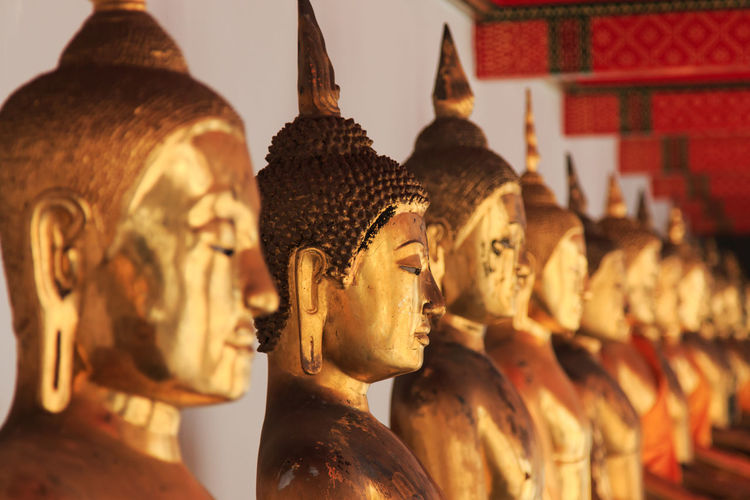 Gold buddha statues in wat pho