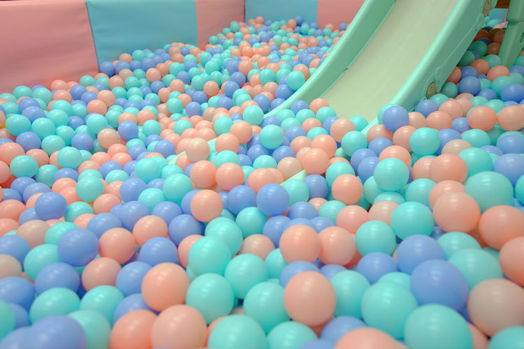 High angle view of multi colored balls in swimming pool