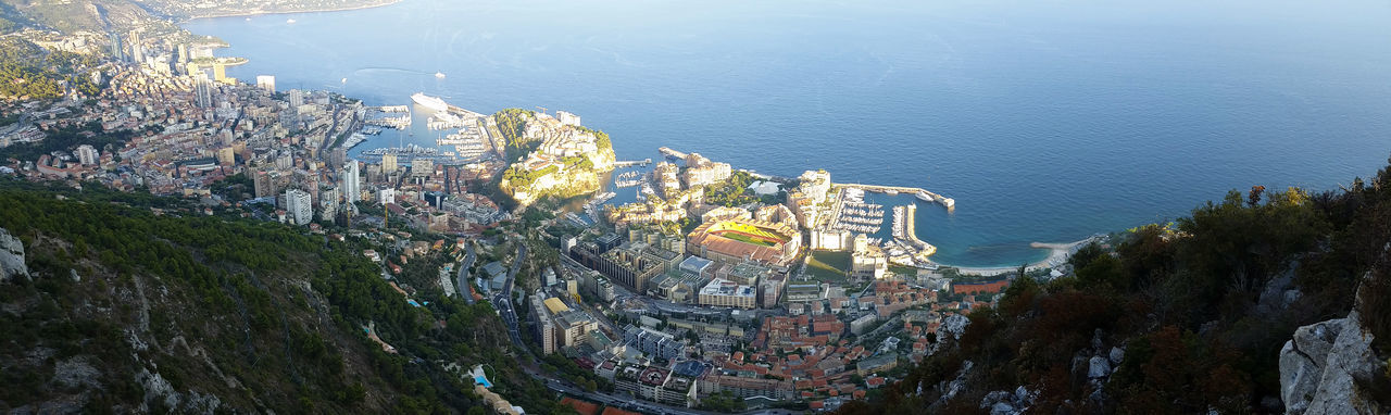 High angle view of townscape by sea