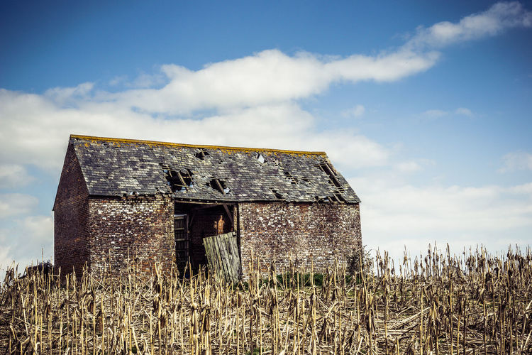 Abandoned built structure against the sky