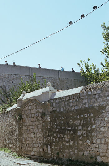 Low angle view of built structure against clear sky