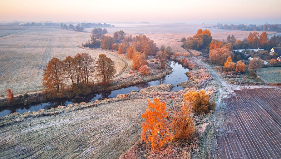 High angle view of river against sky during autumn